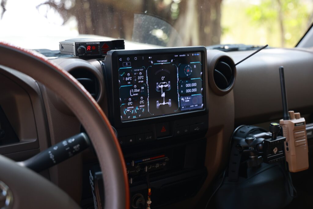Off-road tablet in desert sunset drive